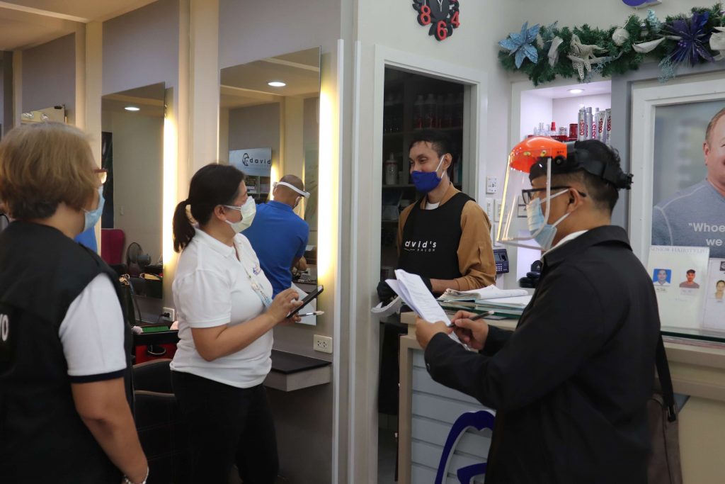 (L-R): DTI Samar OIC Lily Larraga, DTI Leyte OIC Badette Corsiga, Senior Staff of David's Salon, and DTI Biliran OIC Jojo Gayas coducts monitoring in one of the salons in Robinsons North